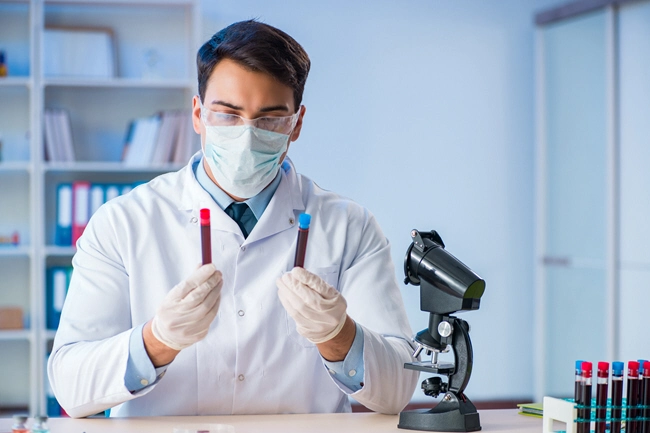 lab assistant testing blood samples in hospital 2