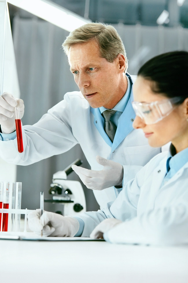 laboratory research scientists doing blood analysis