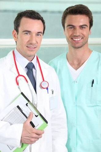 male doctor and nurse with clipboard