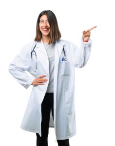 Woman doctor with stethescope poiting to the side 236x300