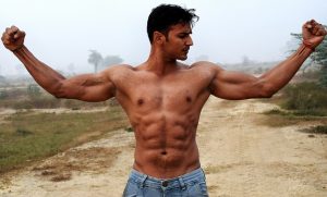 Muscular man flexing biceps  300x181