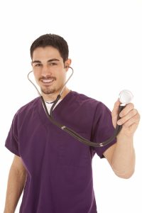 a doctor with a stethoscope is smiling and wearing purple 200x300