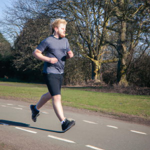 a professional appealing image of a caucasian man or woman jogging on a sunny day