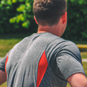 a professional appealing good looking and atheletic image of a caucasian man exercising or playing sports outside on a sunny day