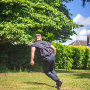 a professional appealing good looking and atheletic image of a caucasian man exercising or playing sports outside on a sunny day