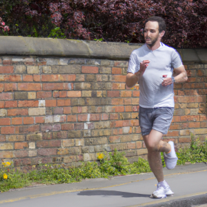 a professional appealing image of a caucasian man or woman jogging on a sunny day